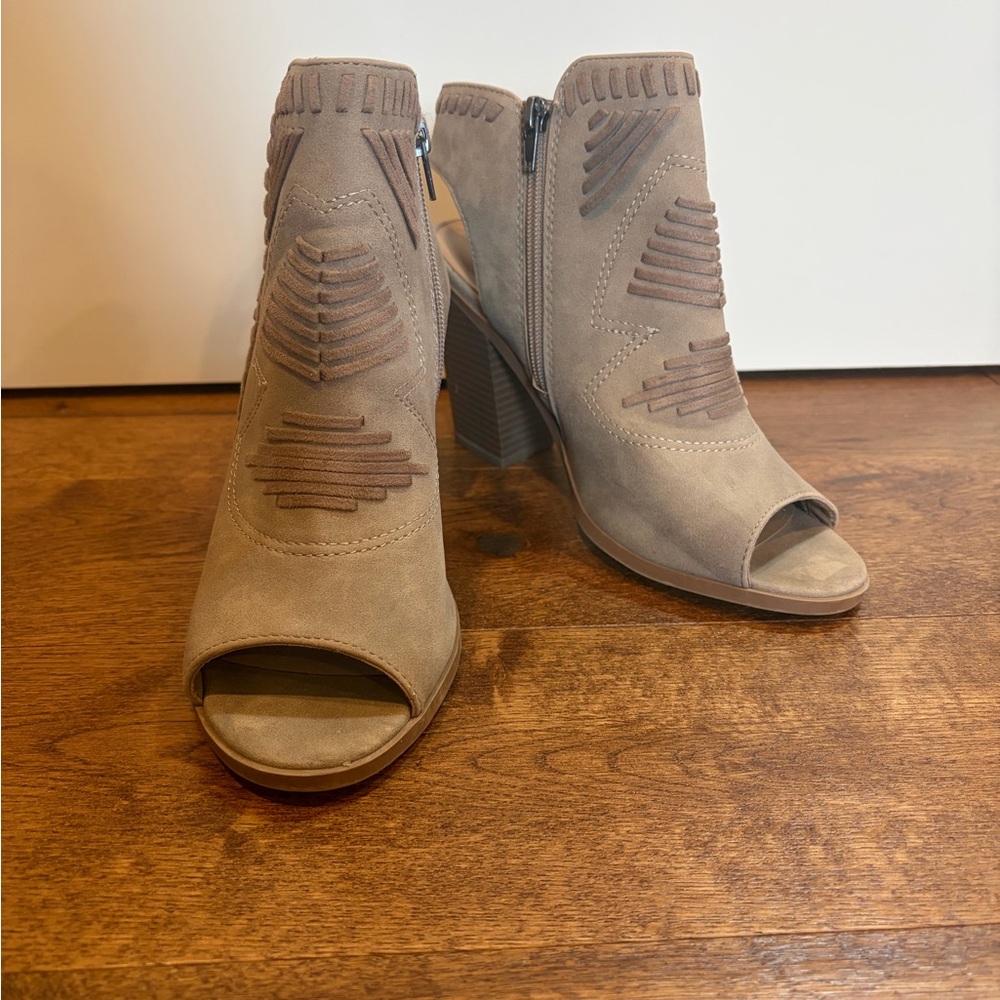 Peep toe heeled booties